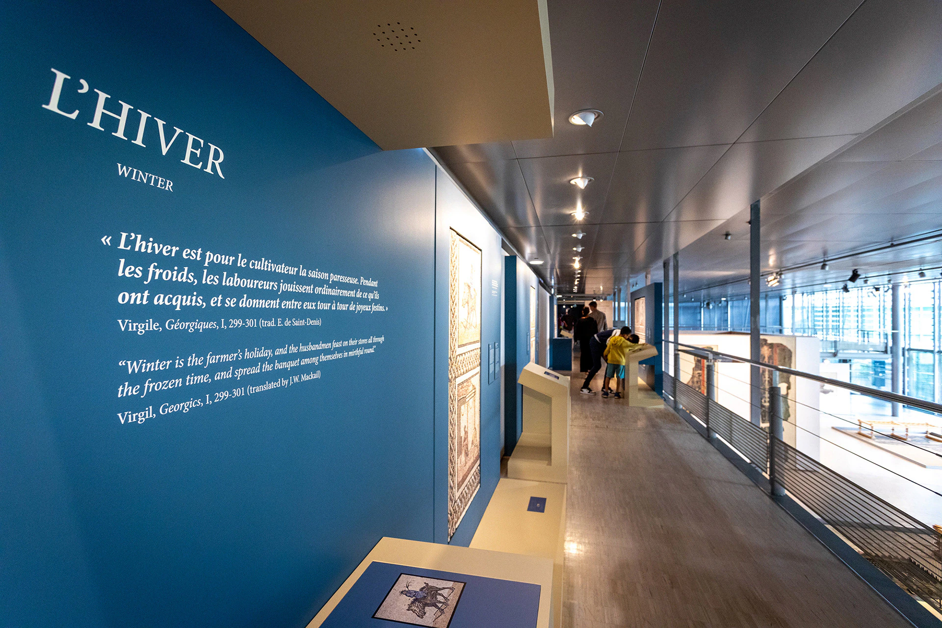 The winter room, on a blue wall, with visitors.