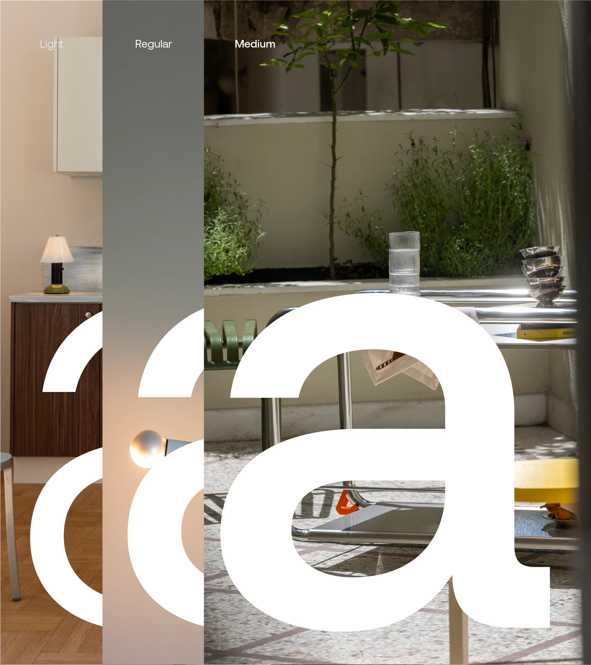The letter a of the brand typeface over a view of the showroom.