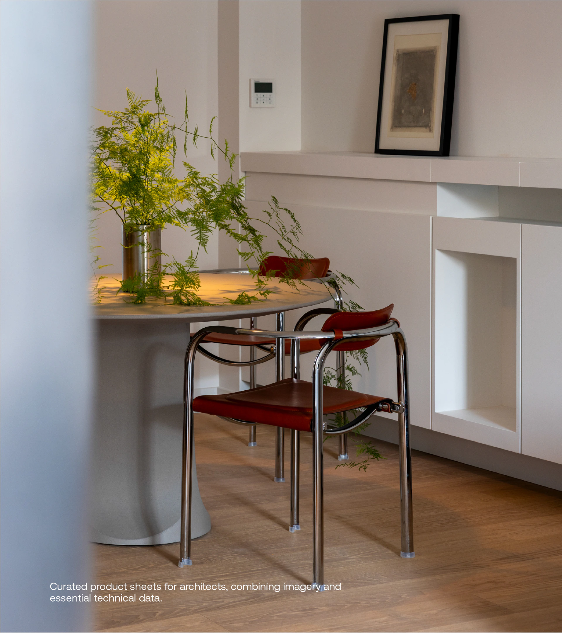 A dining table and chairs in the showroom.